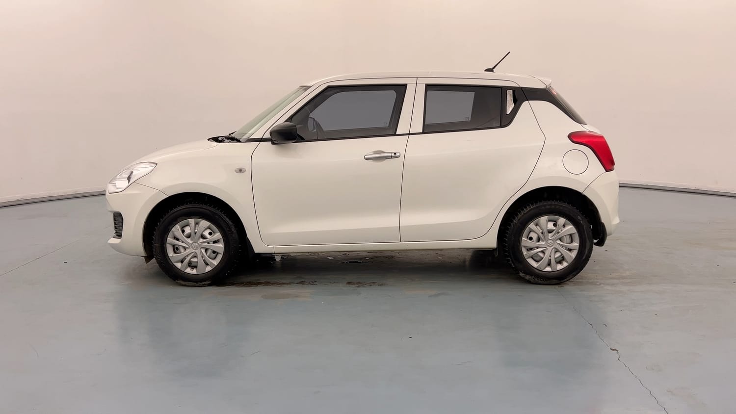 Used 2020 Maruti Suzuki Swift LXi Petrol Manual exterior LEFT SIDE VIEW