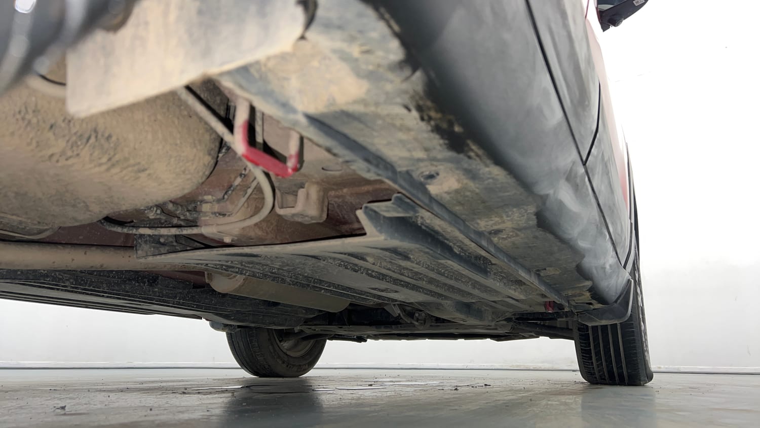 Used 2025 Maruti Suzuki Brezza Zxi Plus AT Dual Tone Petrol Automatic extra REAR RIGHT UNDERBODY VIEW