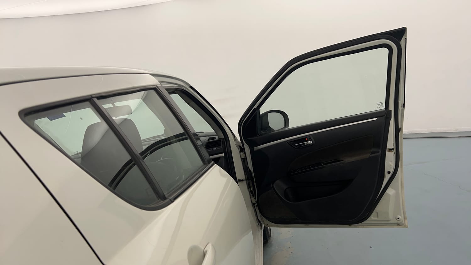 Used 2017 Maruti Suzuki Swift VXI (O) Petrol Manual interior RIGHT FRONT DOOR OPEN VIEW