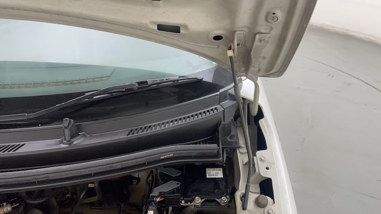 Used 2023 Maruti Suzuki Wagon R VXI 1.0 AGS Petrol Automatic engine ENGINE LEFT SIDE HINGE & APRON VIEW