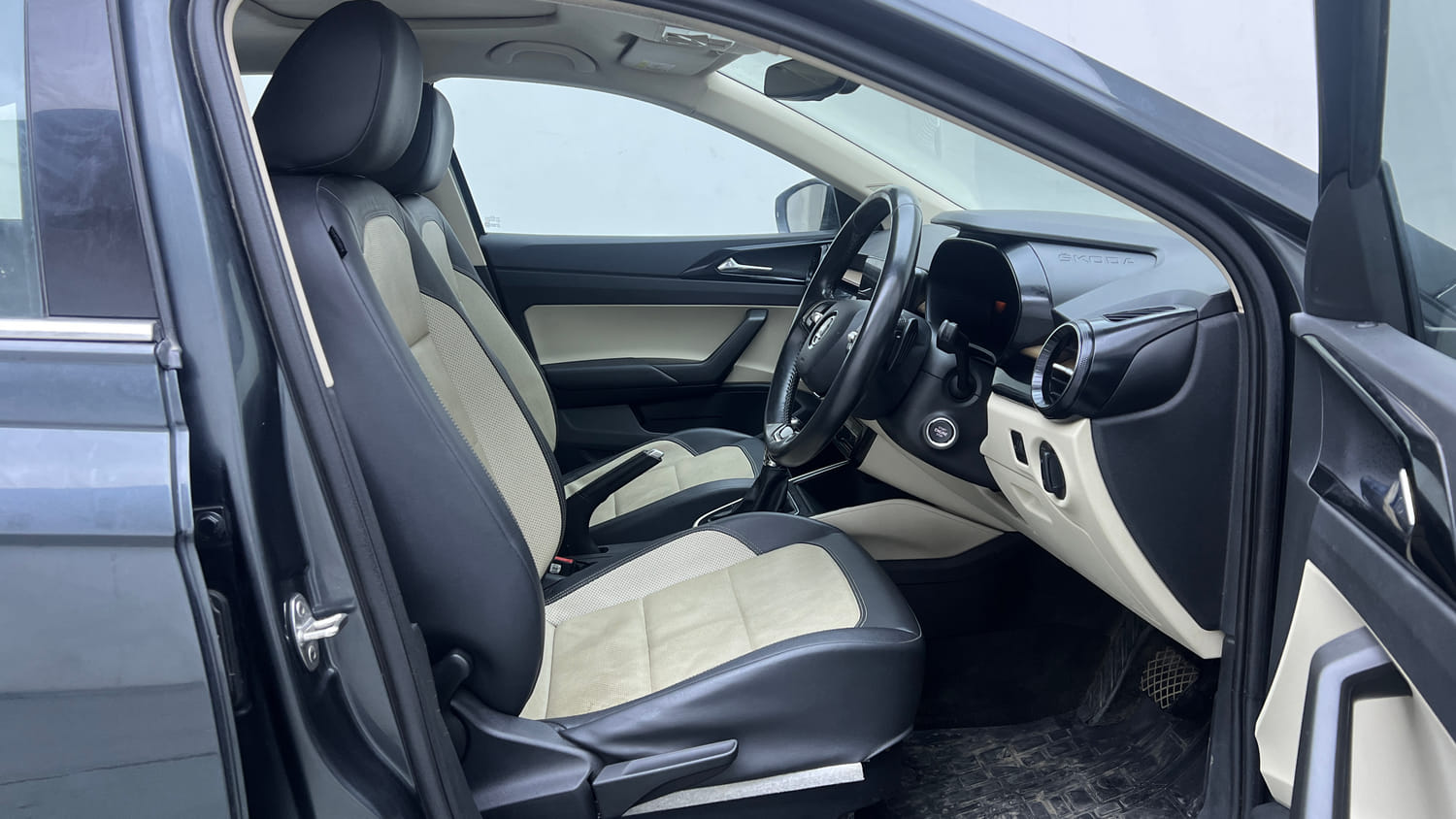 Used 2025 Skoda Slavia Style 1.0L TSI AT Petrol Automatic interior RIGHT SIDE FRONT DOOR CABIN VIEW