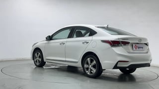 Used 2018 Hyundai Verna 1.6 VTVT SX (O) Petrol + CNG (Outside Fitted) Petrol Manual exterior LEFT REAR CORNER VIEW