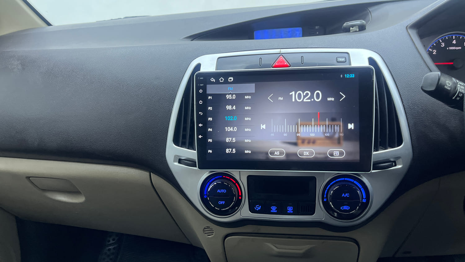 Used 2012 Hyundai i20 Sportz 1.2 Petrol Manual interior MUSIC SYSTEM & AC CONTROL VIEW