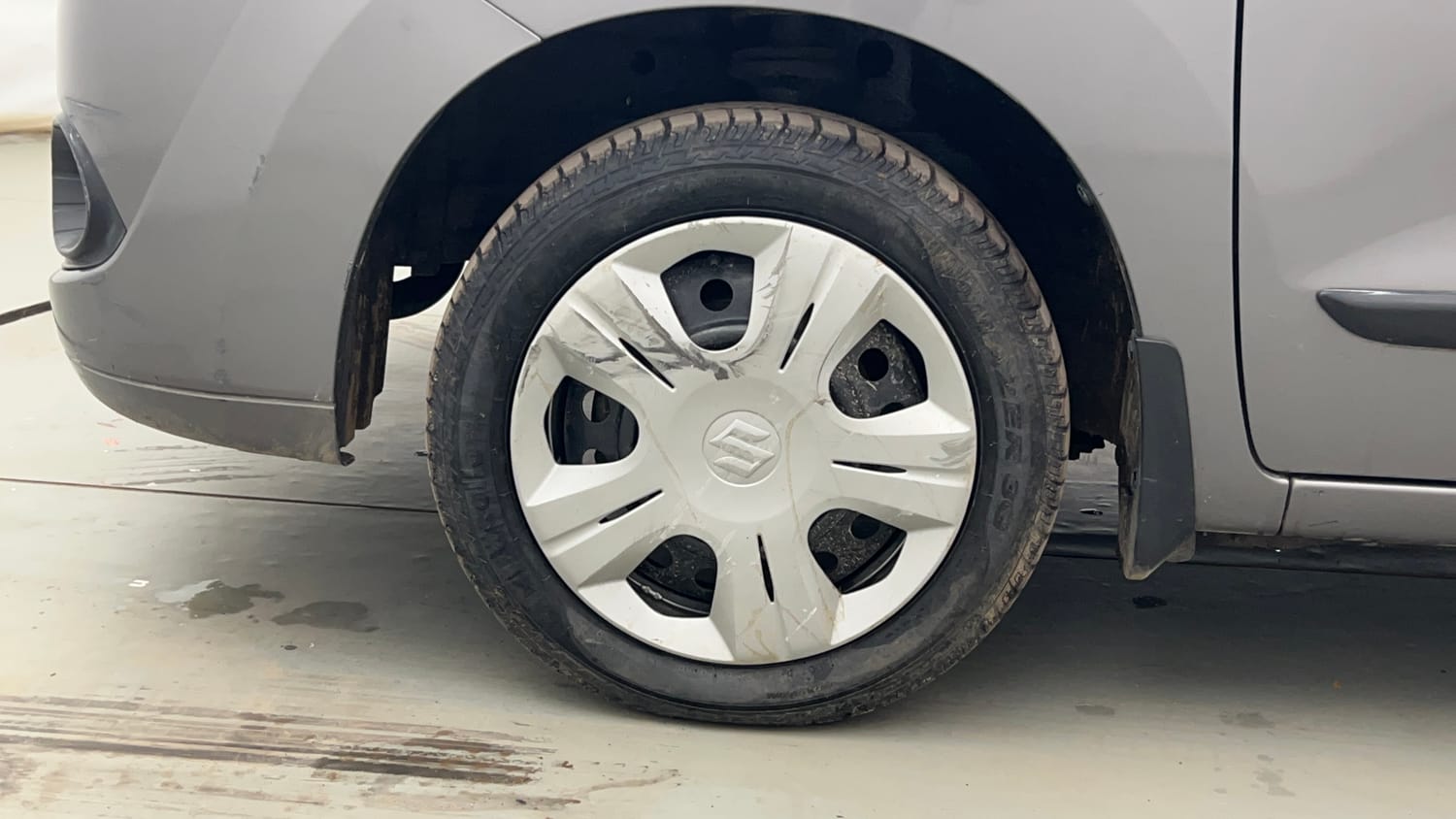 Used 2012 Maruti Suzuki Wagon R 1.0 VXi Petrol Manual tyres LEFT FRONT TYRE RIM VIEW