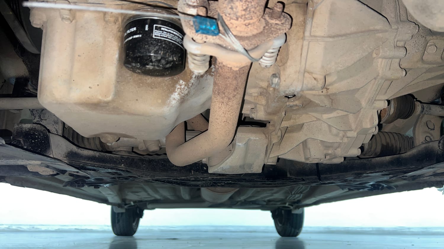 Used 2023 Maruti Suzuki Wagon R VXI 1.0 AGS Petrol Automatic extra FRONT LEFT UNDERBODY VIEW