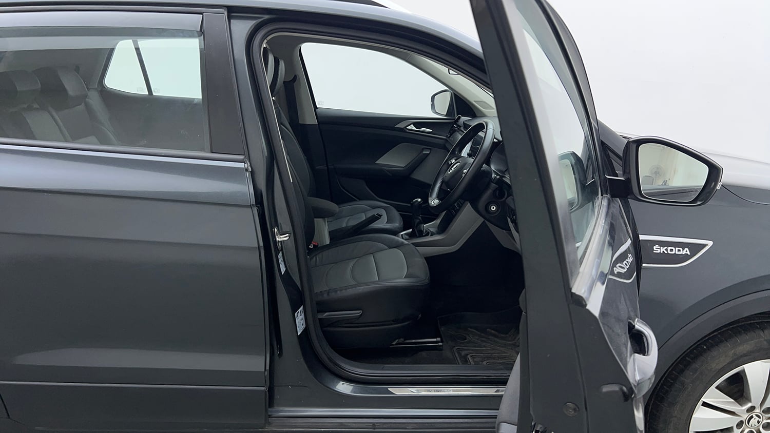 Used 2023 Skoda Kushaq Ambition 1.5L TSI MT Petrol Manual interior RIGHT SIDE FRONT DOOR CABIN VIEW