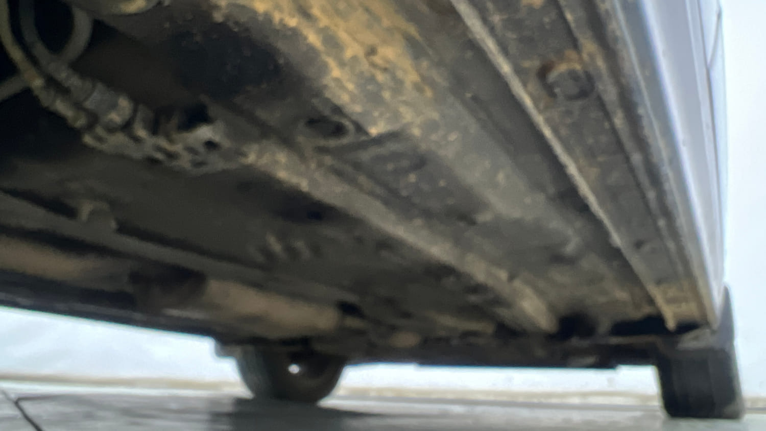 Used 2025 Skoda Slavia Style 1.0L TSI AT Petrol Automatic extra REAR RIGHT UNDERBODY VIEW