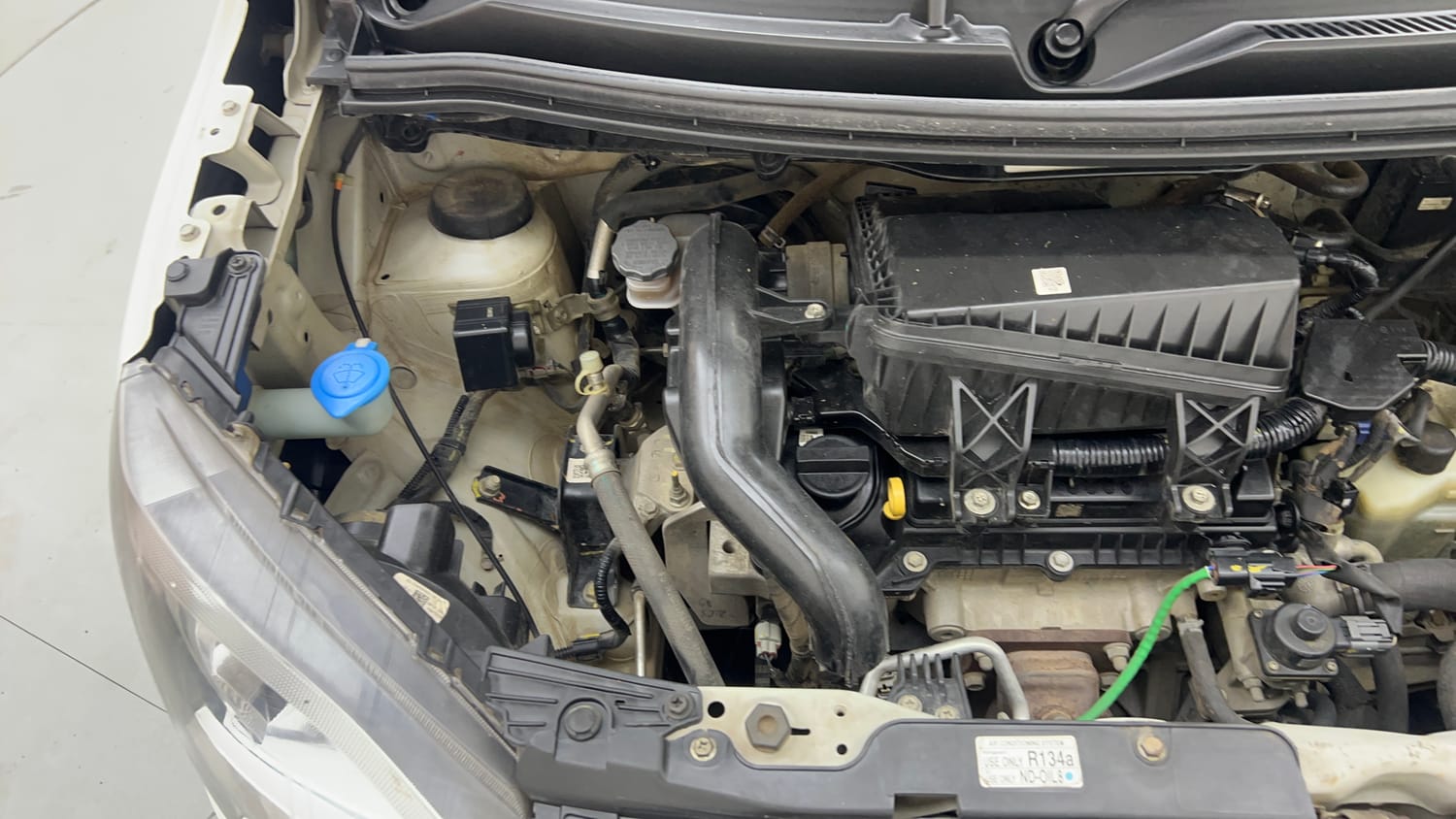 Used 2023 Maruti Suzuki Wagon R VXI 1.0 AGS Petrol Automatic engine ENGINE RIGHT SIDE VIEW