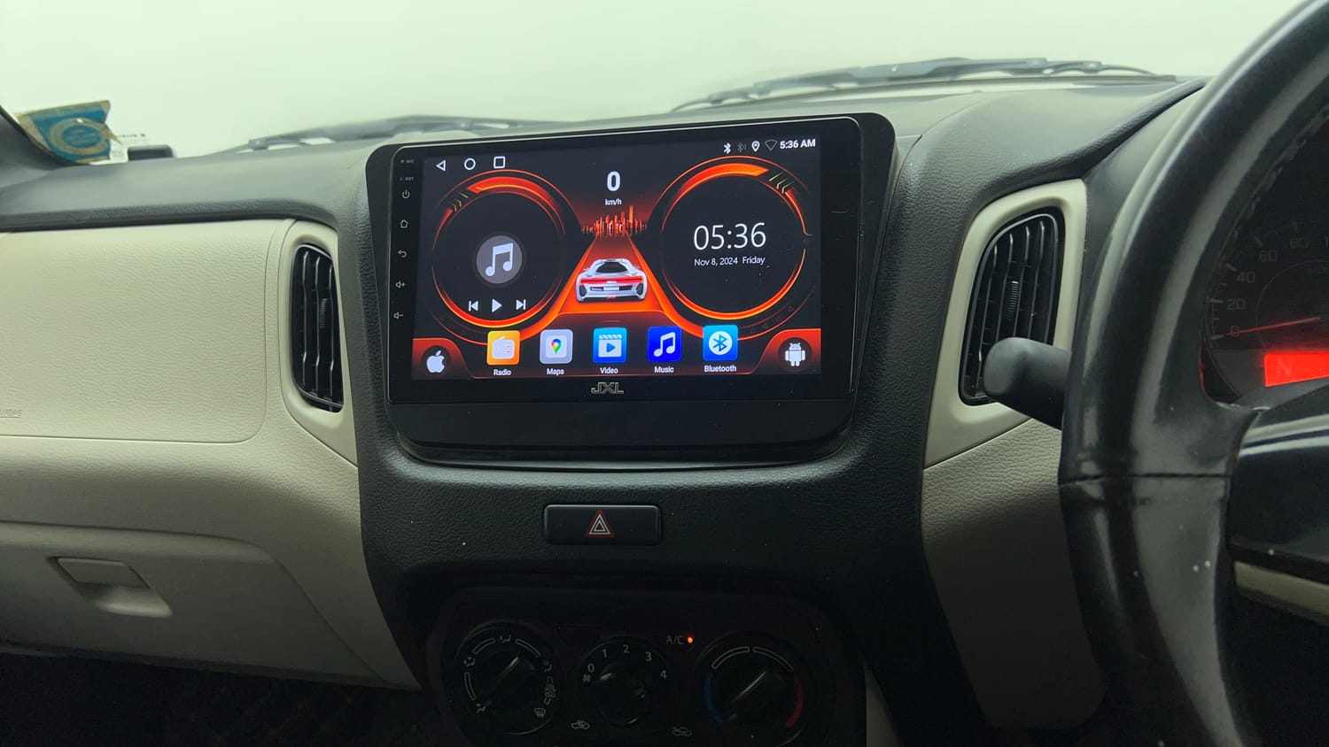 Used 2023 Maruti Suzuki Wagon R VXI 1.0 AGS Petrol Automatic top_features Integrated (in-dash) music system