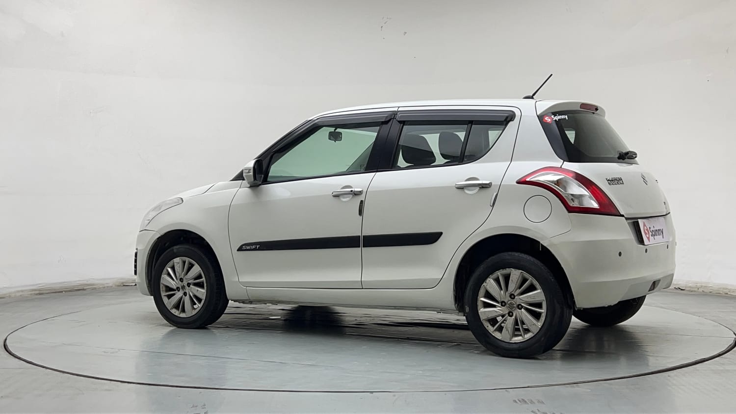 Used 2015 Maruti Suzuki Swift ZXi Petrol Manual exterior LEFT REAR CORNER VIEW