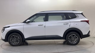 Used 2022 Kia Carens Prestige 1.4 Petrol MT 7 STR Petrol Manual exterior LEFT SIDE VIEW