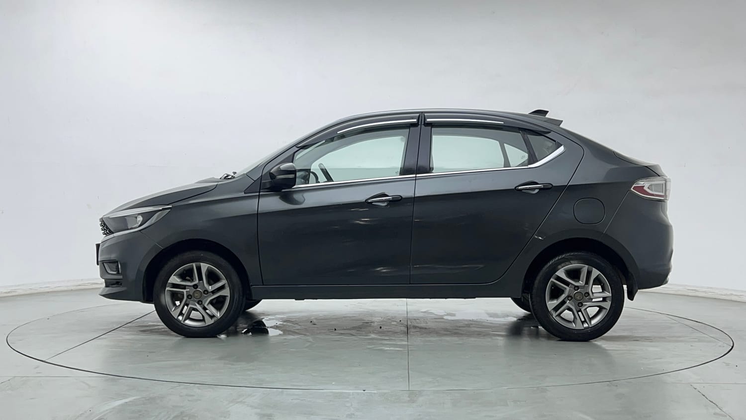 Used 2023 Tata Tigor XZ Plus Leatherette Pack Petrol Manual exterior LEFT SIDE VIEW