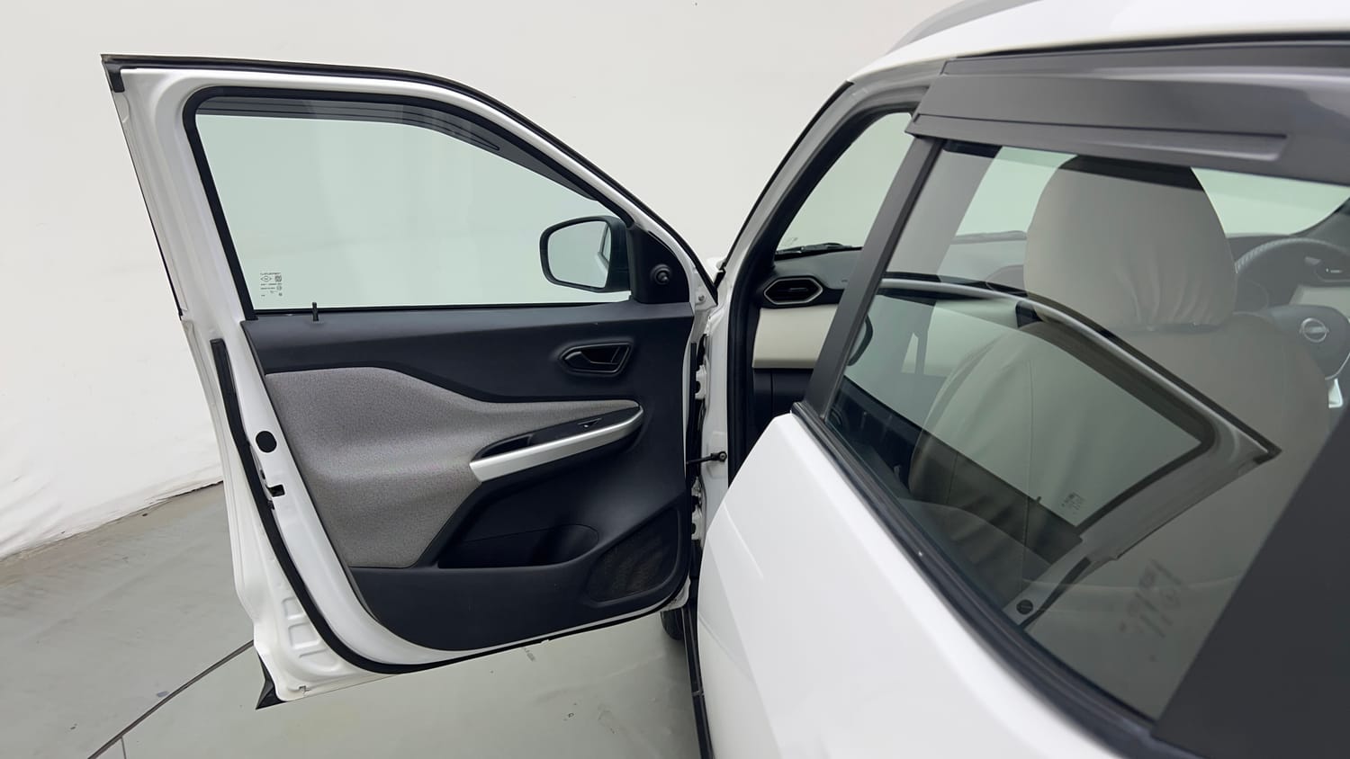 Used 2024 Nissan Magnite XE Petrol Manual interior LEFT FRONT DOOR OPEN VIEW