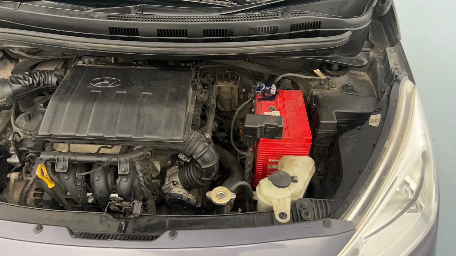 Used 2019 Hyundai Grand i10 Sportz 1.2 Kappa VTVT Petrol Manual engine ENGINE LEFT SIDE VIEW