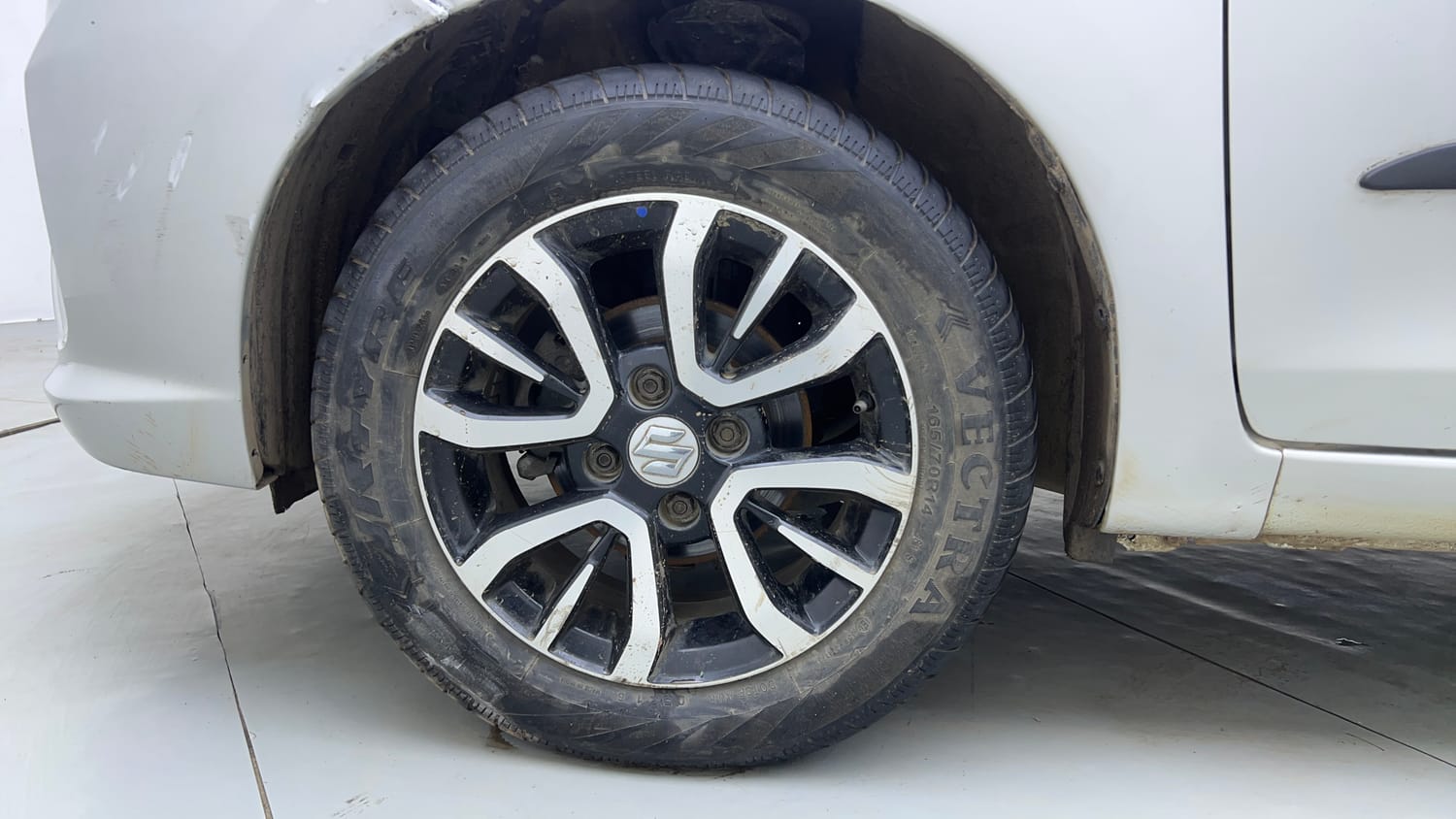 Used 2021 Maruti Suzuki Celerio VXi AMT Petrol Automatic tyres LEFT FRONT TYRE RIM VIEW