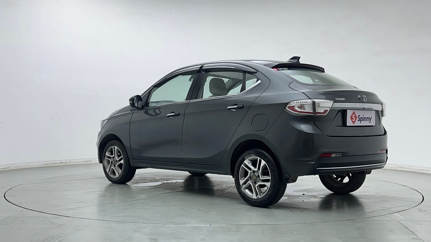Used 2023 Tata Tigor XZ Plus Leatherette Pack Petrol Manual exterior LEFT REAR CORNER VIEW