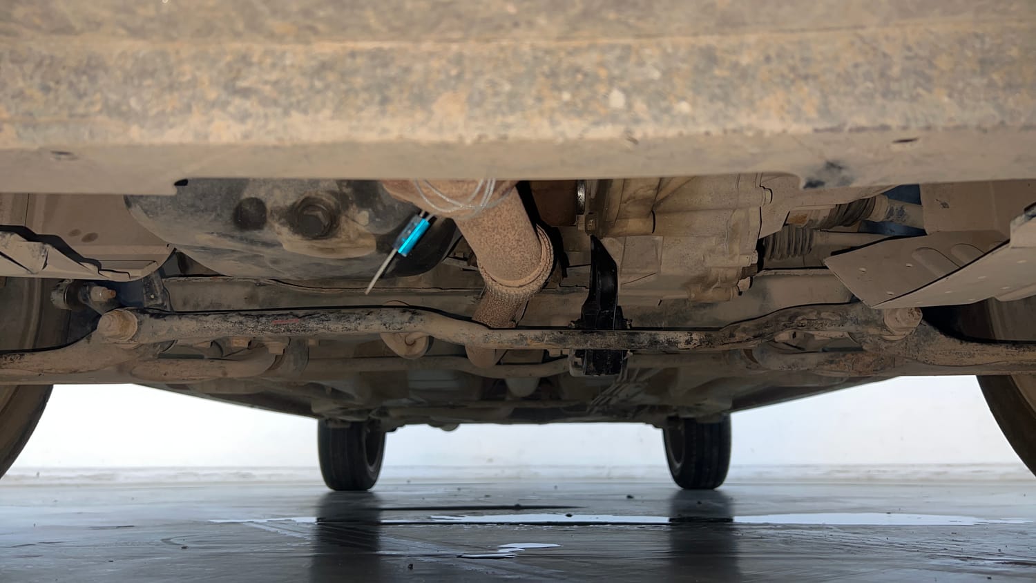 Used 2023 Tata Tigor XZ Plus Leatherette Pack Petrol Manual extra FRONT LEFT UNDERBODY VIEW