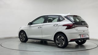 Used 2022 Hyundai New i20 Asta (O) 1.0 Turbo DCT Petrol Automatic exterior LEFT REAR CORNER VIEW