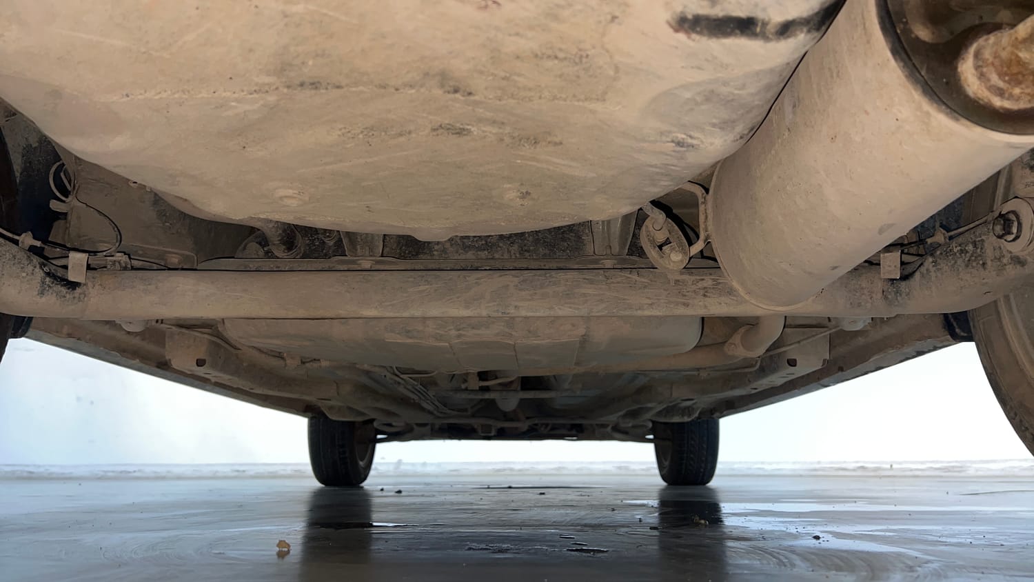 Used 2023 Tata Tigor XZ Plus Leatherette Pack Petrol Manual extra REAR UNDERBODY VIEW (TAKEN FROM REAR)