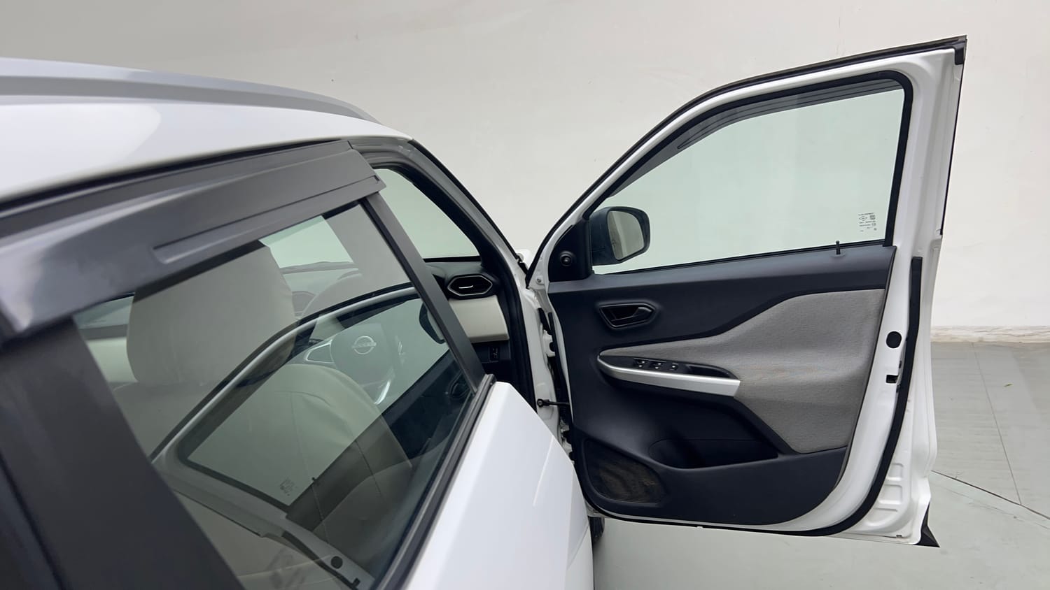 Used 2024 Nissan Magnite XE Petrol Manual interior RIGHT FRONT DOOR OPEN VIEW