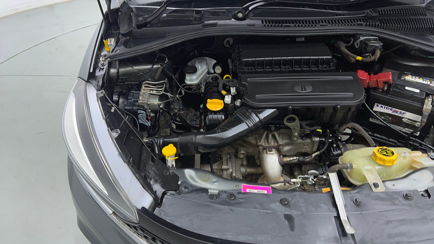 Used 2023 Tata Tigor XZ Plus Leatherette Pack Petrol Manual engine ENGINE RIGHT SIDE VIEW