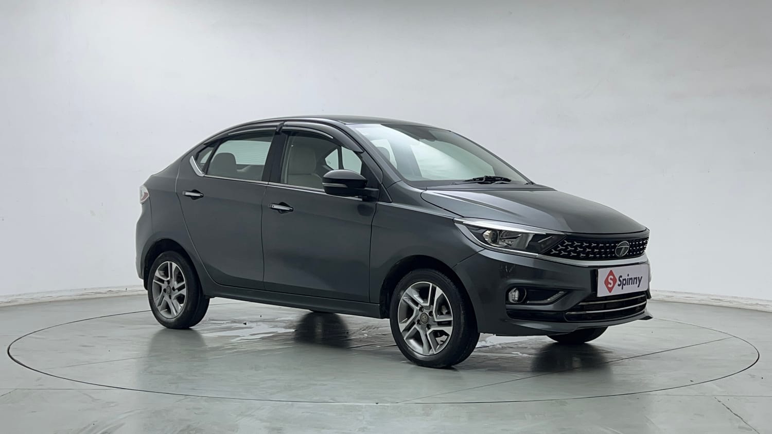 Used 2023 Tata Tigor XZ Plus Leatherette Pack Petrol Manual exterior RIGHT FRONT CORNER VIEW