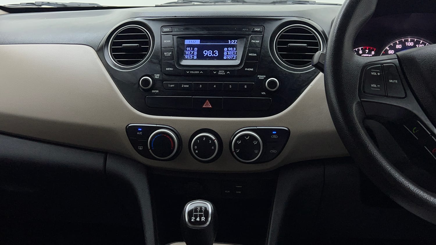 Used 2017 Hyundai Grand i10 Sportz 1.2 Kappa VTVT Petrol Manual interior MUSIC SYSTEM & AC CONTROL VIEW