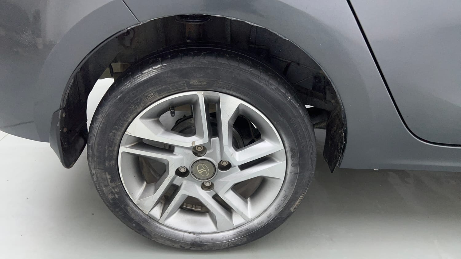 Used 2023 Tata Tigor XZ Plus Leatherette Pack Petrol Manual tyres RIGHT REAR TYRE RIM VIEW