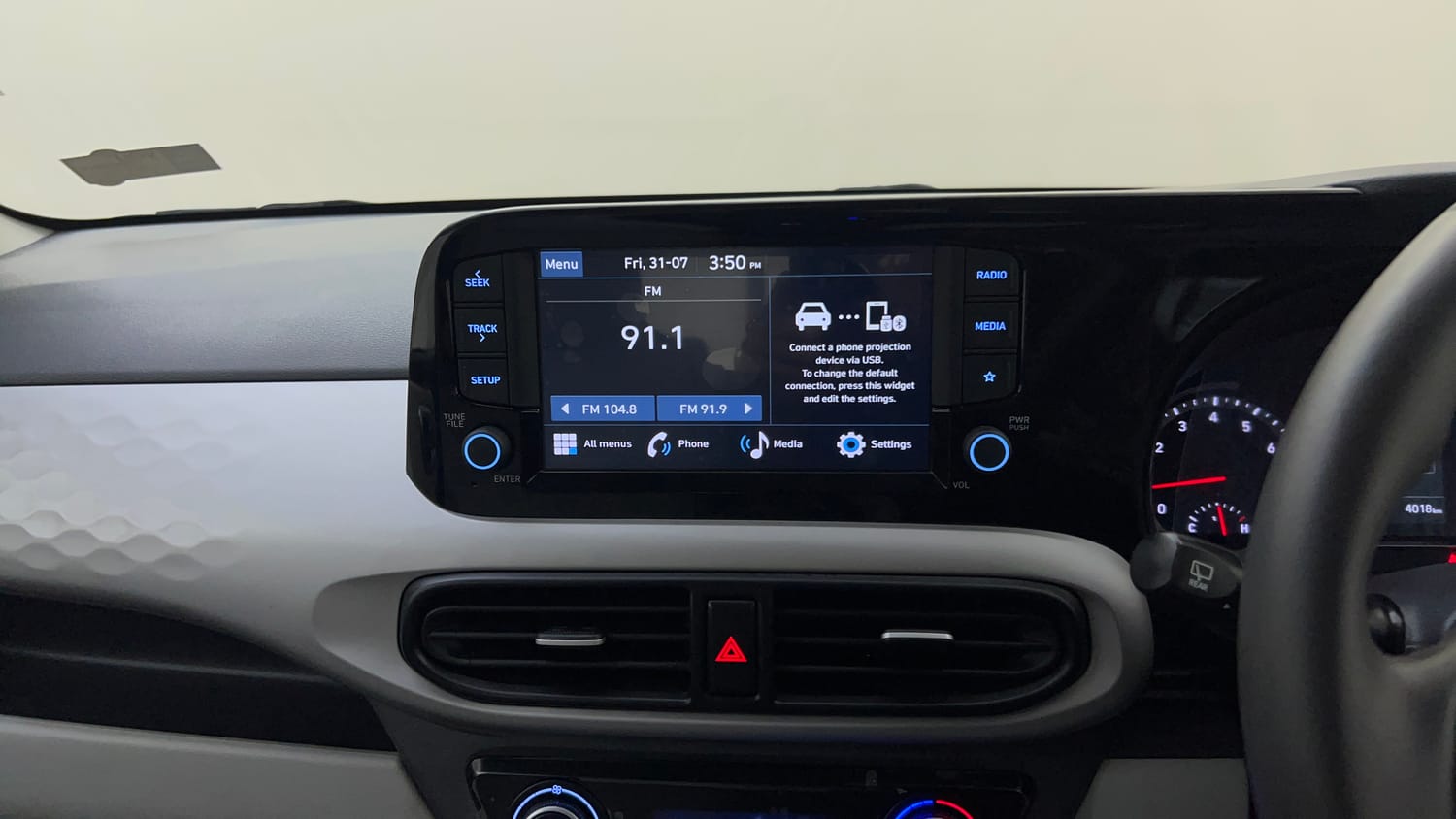Used 2025 Hyundai Grand i10 Nios Asta 1.2 Kappa AMT Petrol Automatic top_features Integrated (in-dash) music system