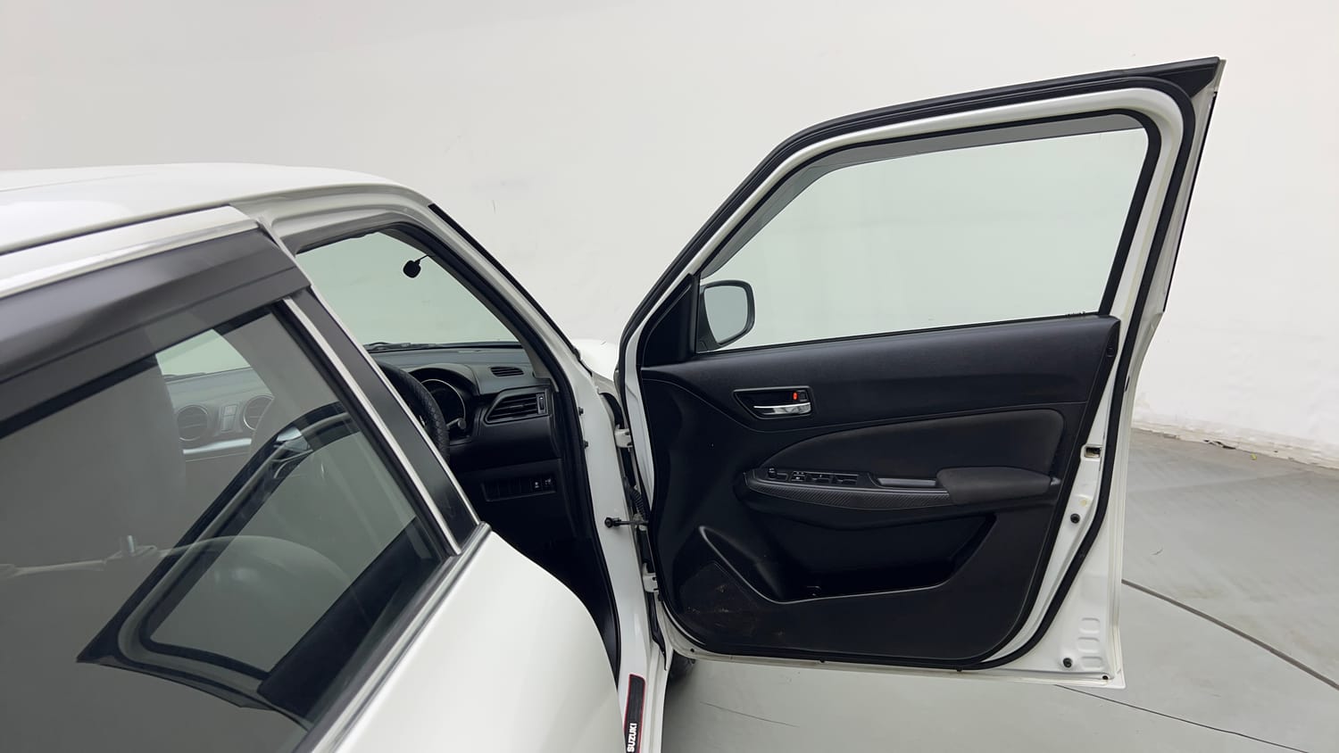 Used 2023 Maruti Suzuki Swift VXi Petrol Manual interior RIGHT FRONT DOOR OPEN VIEW