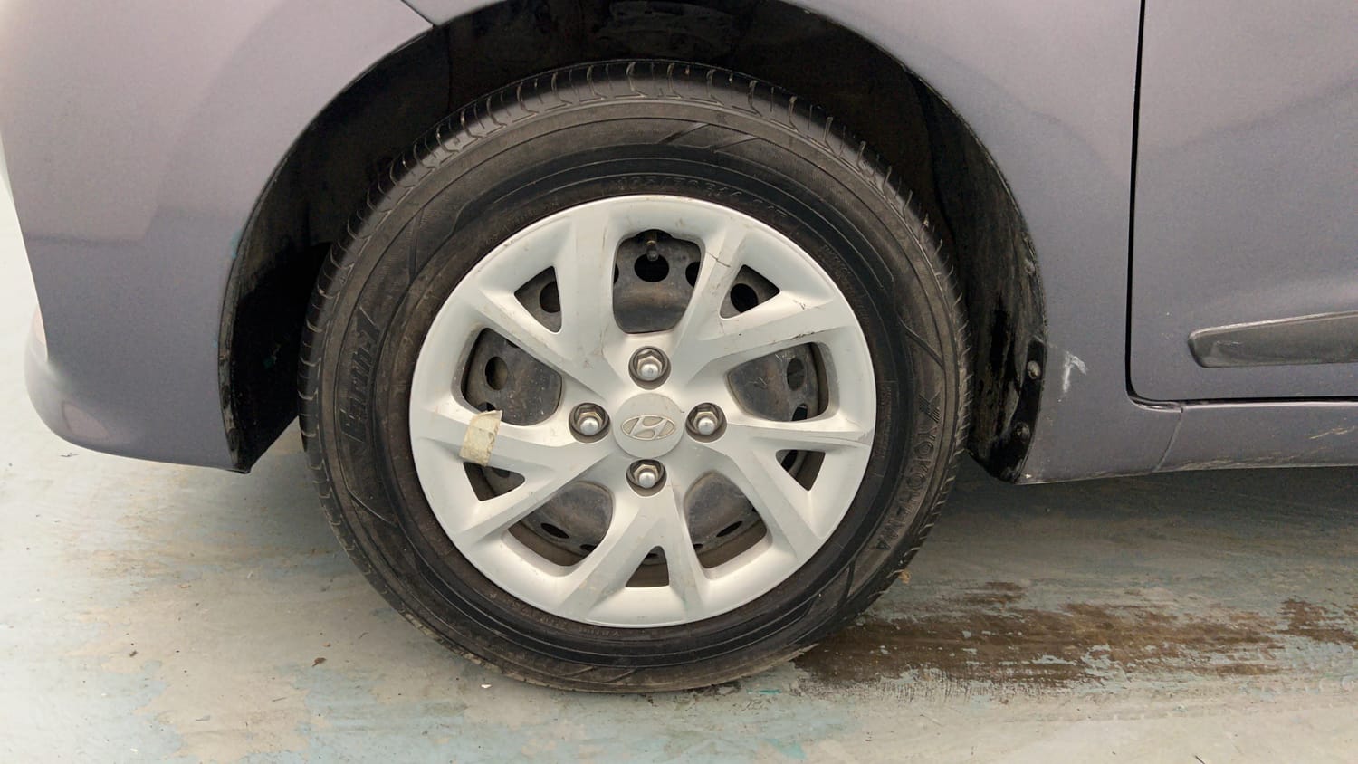 Used 2019 Hyundai Grand i10 Sportz 1.2 Kappa VTVT Petrol Manual tyres LEFT FRONT TYRE RIM VIEW