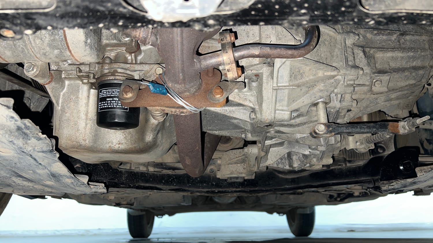 Used 2023 Maruti Suzuki Swift VXi Petrol Manual extra FRONT LEFT UNDERBODY VIEW