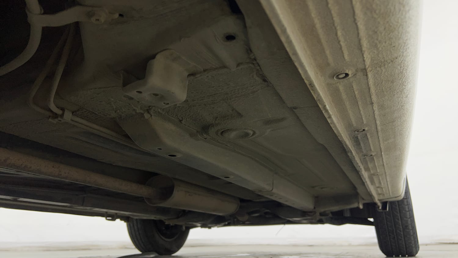 Used 2015 Maruti Suzuki Celerio VXi AMT Petrol Automatic extra REAR RIGHT UNDERBODY VIEW