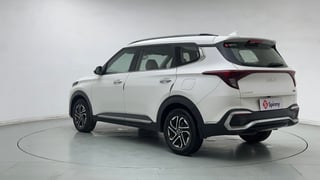 Used 2022 Kia Carens Luxury Plus 1.4 Petrol 7 STR Petrol Manual exterior LEFT REAR CORNER VIEW