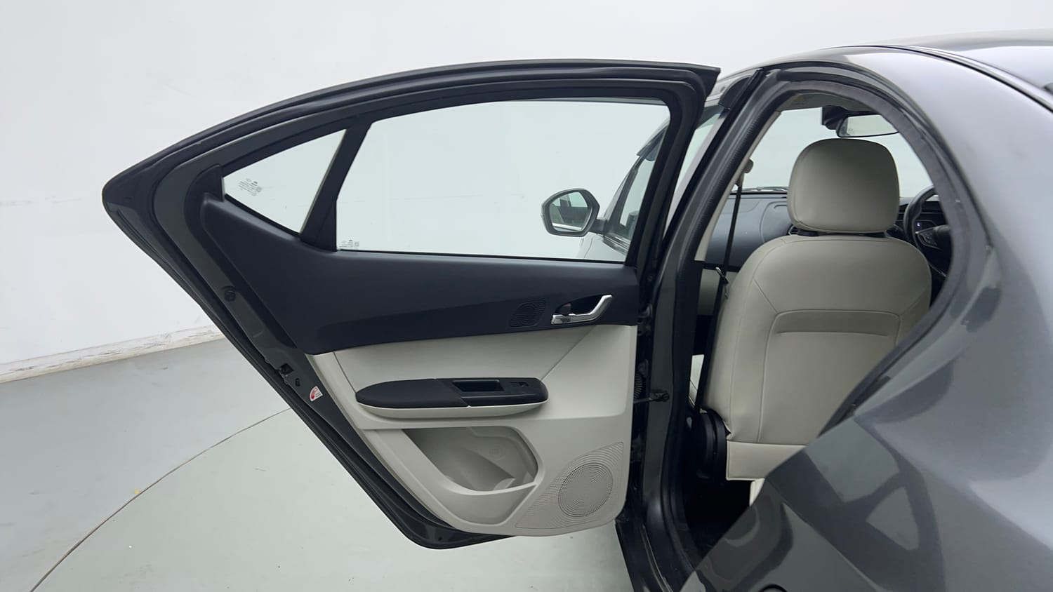 Used 2023 Tata Tigor XZ Plus Leatherette Pack Petrol Manual interior LEFT REAR DOOR OPEN VIEW