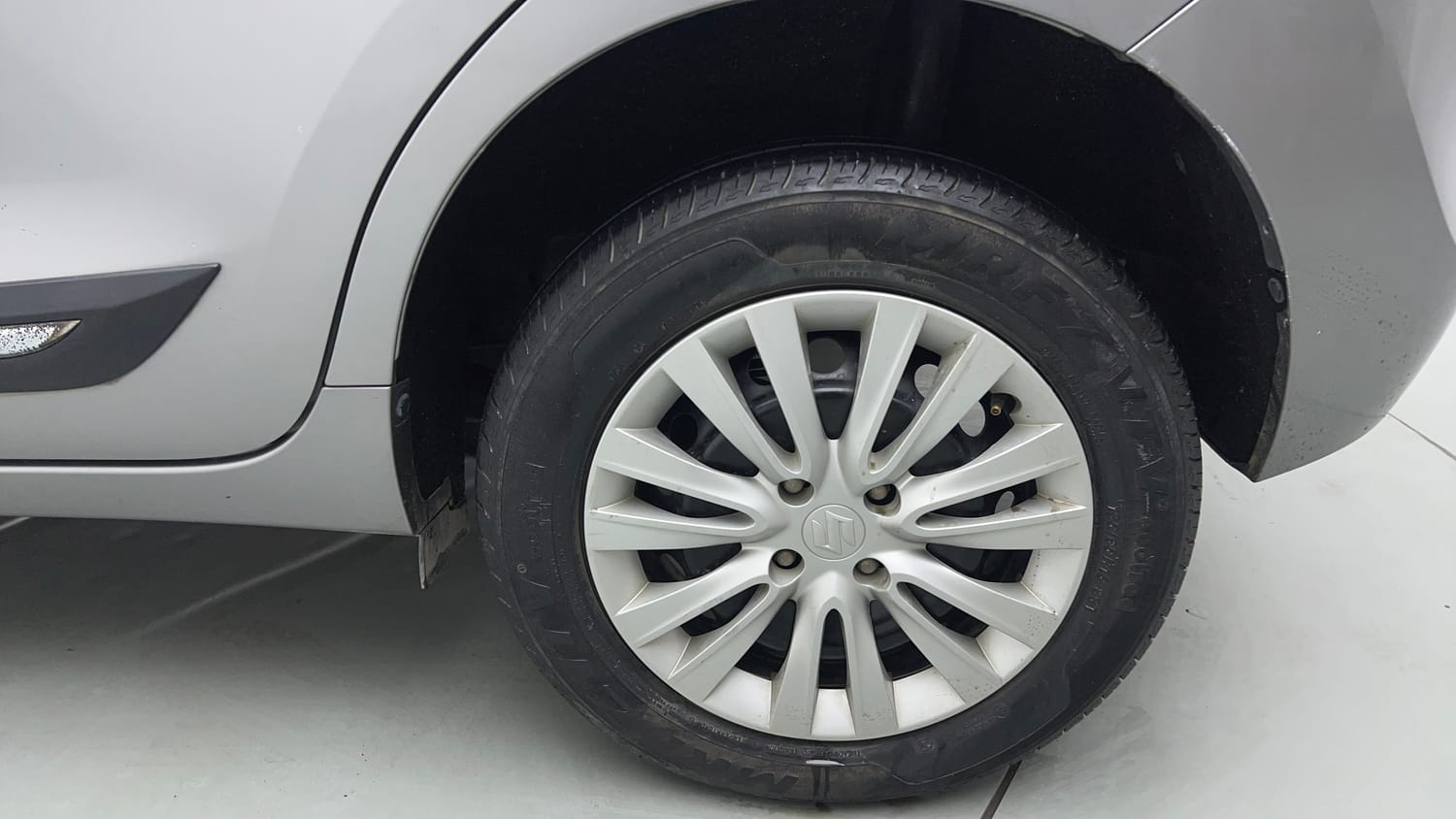 Used 2021 Maruti Suzuki Baleno Delta Petrol Manual tyres LEFT REAR TYRE RIM VIEW