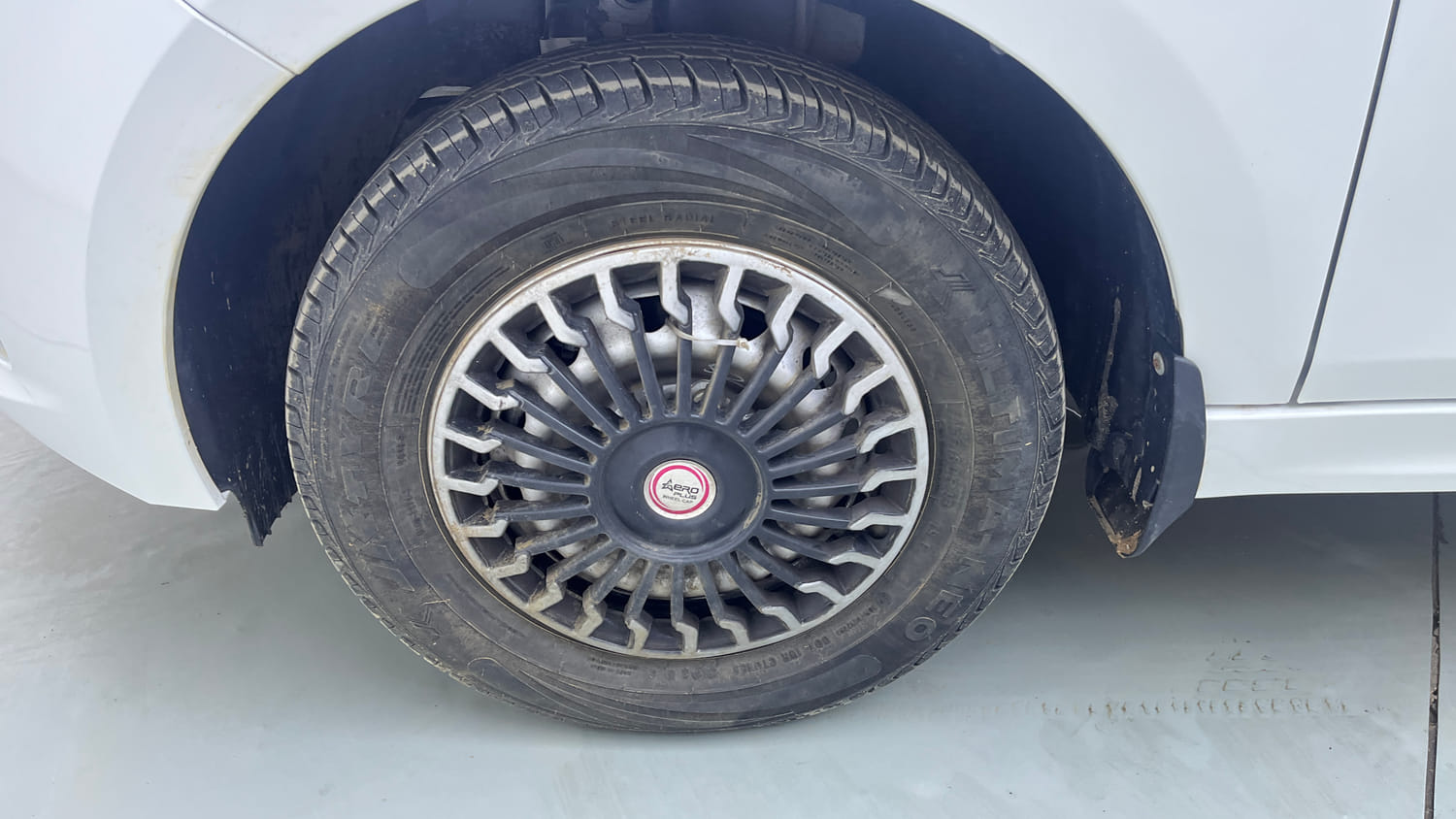 Used 2026 Tata Tiago XE Petrol Manual tyres LEFT FRONT TYRE RIM VIEW