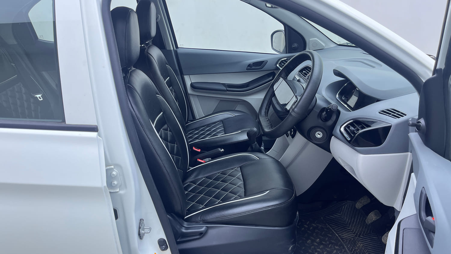 Used 2026 Tata Tiago XE Petrol Manual interior RIGHT SIDE FRONT DOOR CABIN VIEW