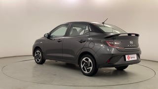 Used 2023 Hyundai Aura S 1.2 Petrol Petrol Manual exterior LEFT REAR CORNER VIEW