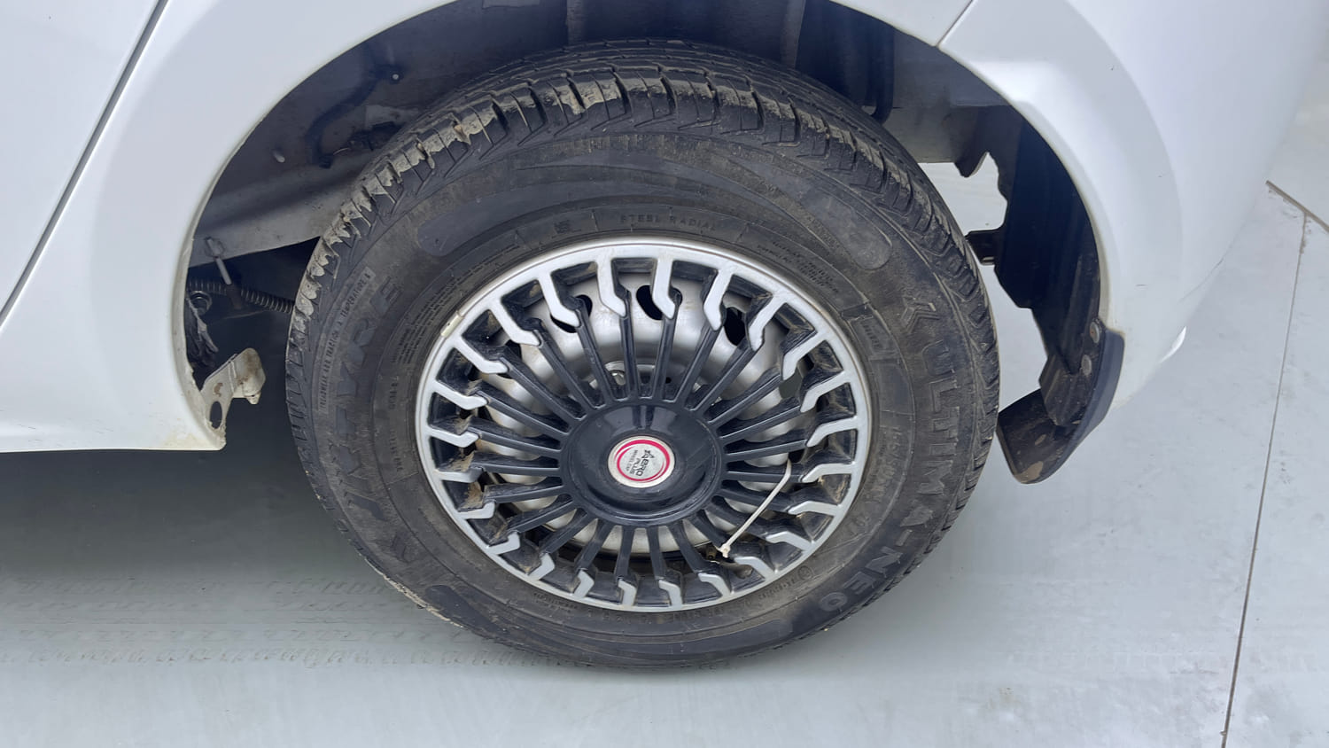 Used 2026 Tata Tiago XE Petrol Manual tyres LEFT REAR TYRE RIM VIEW