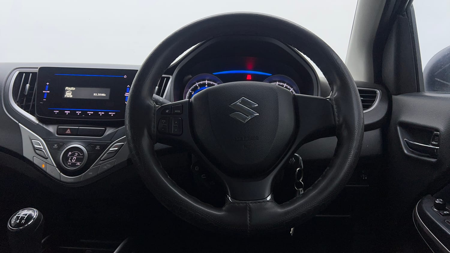 Used 2021 Maruti Suzuki Baleno Delta Petrol Manual interior STEERING VIEW