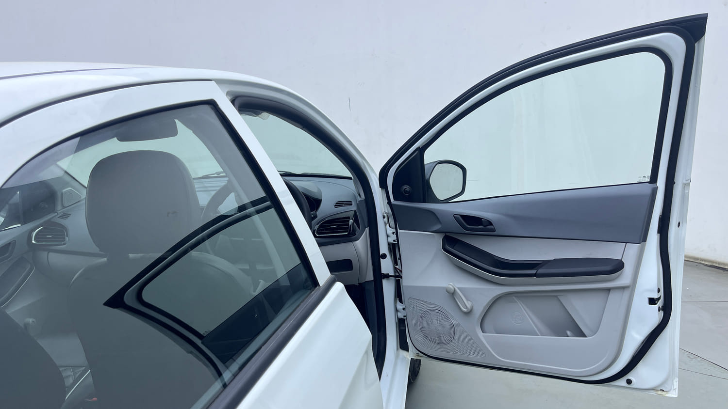 Used 2026 Tata Tiago XE Petrol Manual interior RIGHT FRONT DOOR OPEN VIEW
