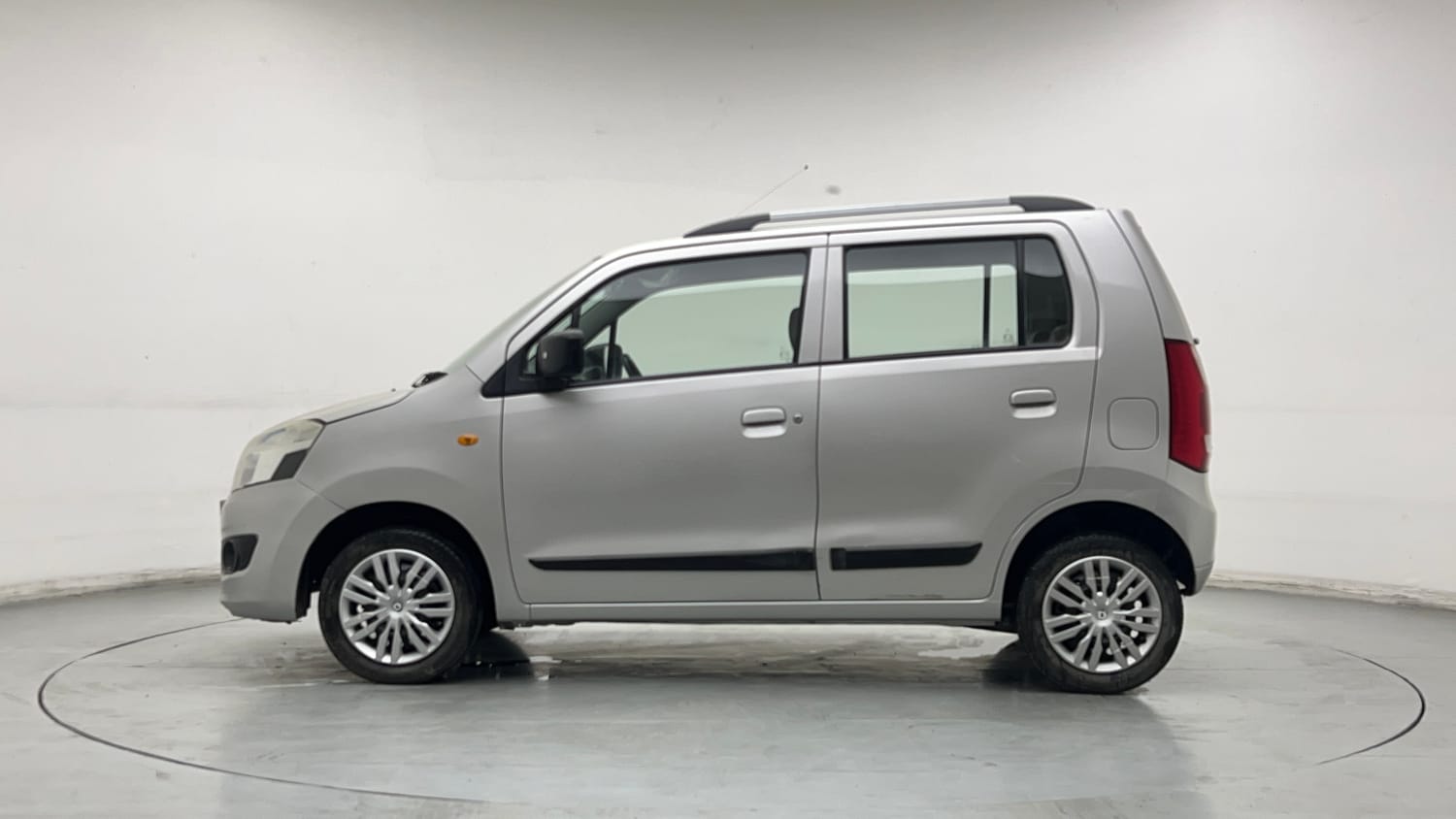 Used 2013 Maruti Suzuki Wagon R VXI Petrol Manual exterior LEFT SIDE VIEW
