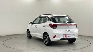 Used 2024 Hyundai Grand i10 Nios Asta 1.2 Kappa AMT Petrol Automatic exterior LEFT REAR CORNER VIEW