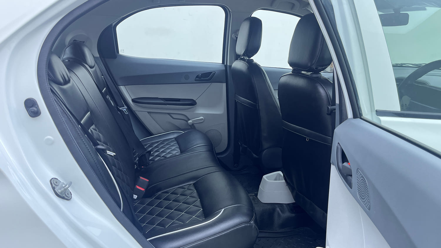 Used 2026 Tata Tiago XE Petrol Manual interior RIGHT SIDE REAR DOOR CABIN VIEW