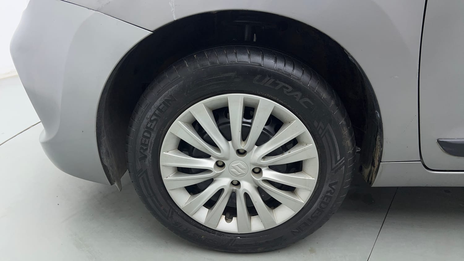 Used 2021 Maruti Suzuki Baleno Delta Petrol Manual tyres LEFT FRONT TYRE RIM VIEW