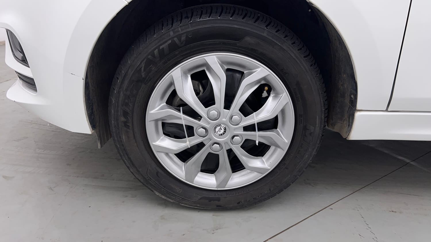 Used 2025 Tata Tiago XT Petrol Manual tyres LEFT FRONT TYRE RIM VIEW