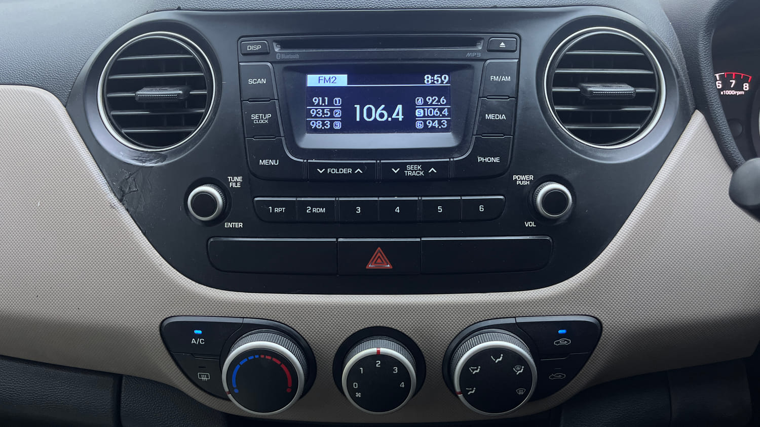 Used 2016 Hyundai Grand i10 Sportz 1.2 Kappa VTVT Petrol Manual interior MUSIC SYSTEM & AC CONTROL VIEW