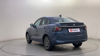 Used 2025 Maruti Suzuki Dzire ZXi Plus Petrol Manual exterior LEFT REAR CORNER VIEW