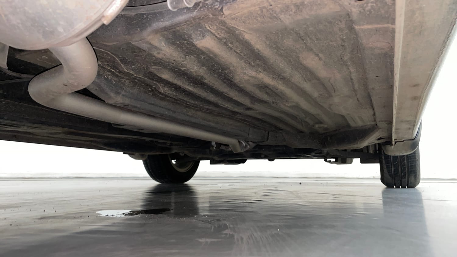 Used 2023 Honda Amaze VX 1.2 Petrol CVT Petrol Automatic extra REAR RIGHT UNDERBODY VIEW